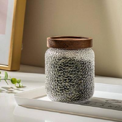 China Hot Selling Sustainable 350ml 500ml 800ml Round High Borosilicate Glass Etched Wooden Lid Bamboo Stopper Airtight Glass Storage Jar for sale