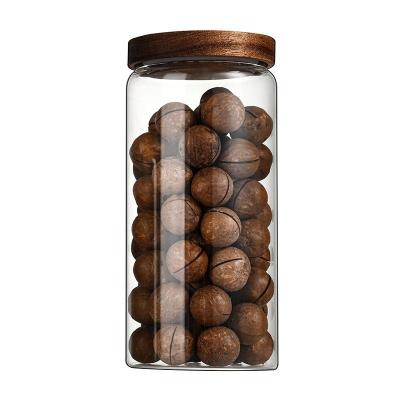 China Hot Sale 500ml 850ml 1250ml Sustainable Borosilicate Glass Beware Clear Sealed Storage Jar Coffee Nut Food Storage Jar With Acacia Lid for sale