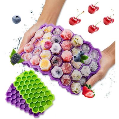 China Amazon Sustainable Hot Sale 37 Cavities Silicone Honeycomb Shaped Durable Ice Cube Tray Mold Maker With Lid for sale