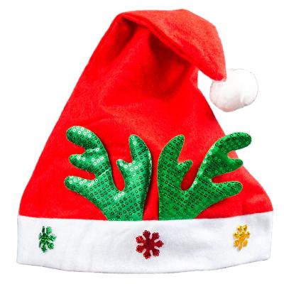 China Polyester Fiber Non Woven Cheap Christmas Hat With Sequined Antler Decoration for sale