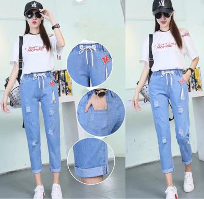 China Explosive viable European and American elastic hole gaiters thin women's jeans new for sale