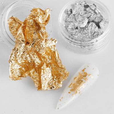 China 1 Box Gold Nail Art Foil Sticker Paper 3d Silver Foil UV Gel Polish Tools Fashionable Glitter Design Nail Decoration for sale