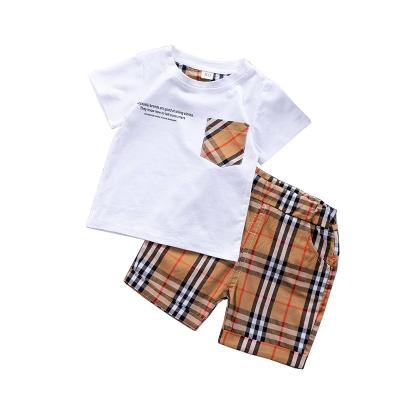 China Color Fade Proof Wholesale 1-5 Years Old Boys Girls Baby T-shirt Pocket Plaid Letter Sports Board Wear Shorts Kids Summer Clothing Sets for sale