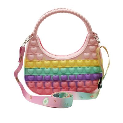 China Relieve Stress 2022 New Moon Bay Makeup Bag Decompression Puzzle Silicone Toy Handheld Diagonal Design for sale