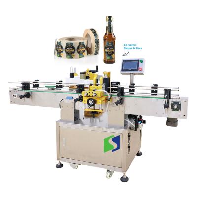 China Automatic food labeling machine/round sticker bottle labeling machine/glued on labels labeling machine for sale