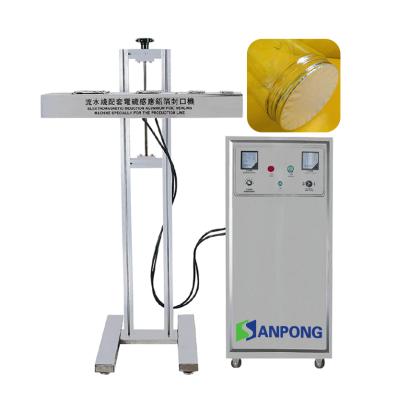 China Full Automatic Food Aluminum Foil Sealing Machine Jar Induction Sealing Machine for sale