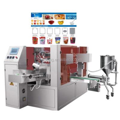 China Automatic Horizontal Juice Ketchup Sauce Pouch Doypack Holder Food Liquid Filling Packaging Machine for sale