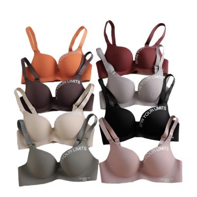 China New Solid Color Seamless Seamless Letter Printed Ladies Push Up Sexy Wireless Padded Seamless Bra for sale