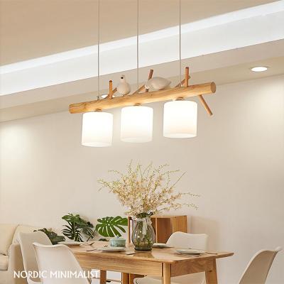 China Modern minimalist Nordic modern minimalist solid wood restaurant chandelier creative personality led bird Japanese log lighting chandelier for sale