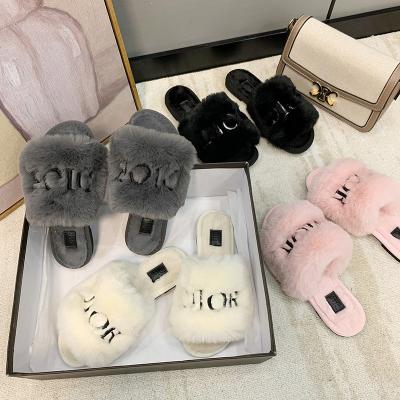 China 2021 Famous Flip Flops Fluffy Slippers Fur Slippers Brands Fashion Trend Designer Home Slippers For Women for sale