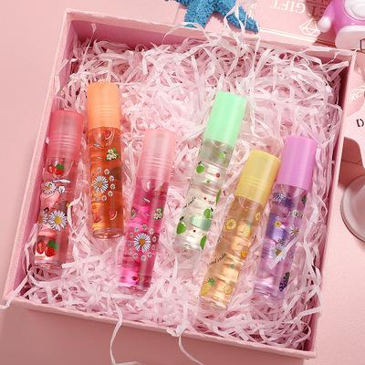 China Colorless Transparent Waterproof Fruit Lip Oil Lip Balm Lipstick Moisturizer Moisturize Roll-on Sheath Lip Hydration for sale