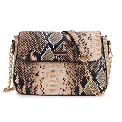 China Retro design snake pattern square zipper pocket small personality bag oval square messenger bag lady bag for sale