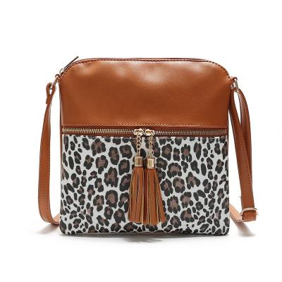 China Small Bag New Leopard Print Ladies One-Shoulder Double Tassel Bag Leopard Print Wallet Fake Square Compartment Pendant Leather Messenger Bag for sale