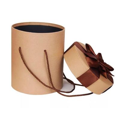 China Flower Box Paper Tube Cardboard Cylinder Handmade Wholesale Round Rose Gift Packaging Pink Simple Gold Customized Logo for sale