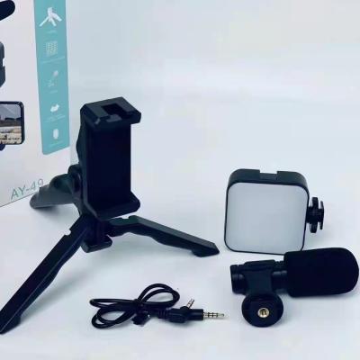 China Professional Video Shotgun Microphone AY-49 Smartphone Vlog Fill Light Kit with Tripod Microphone Phone Holder Remote Controller for Shooting for sale