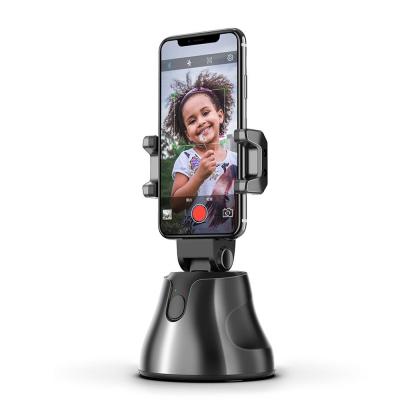 China Apai Genie Plastic Object Phone Holder Auto Selfie Tracking Stick Smartphone Selfie Shooting Gimbal For Vlog Video Tiktok Youtube Live for sale