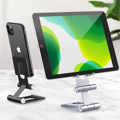 China Newest Universal Metal Metal Phone Tablet Desktop Mount Stand Holder Adjustable Rotating Portable Mobile Phone Holder For iPad for sale