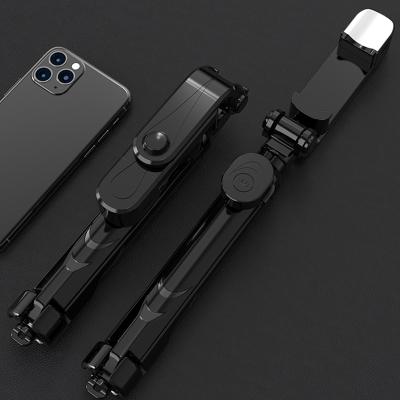 China New Wireless Cell Phone BT Selfie Stick Tripod With Fill Light Selfie Monopod Shutter Live Broadcast Phone Holder Tiktok for sale