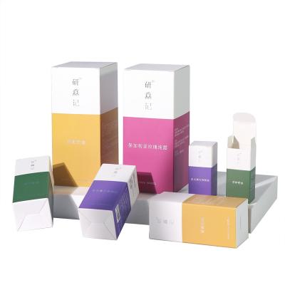 China Recyclable wholesale cosmetic packaging perfume lip gloss lipstick eye serum folding carton with custom silver foiling logo for sale