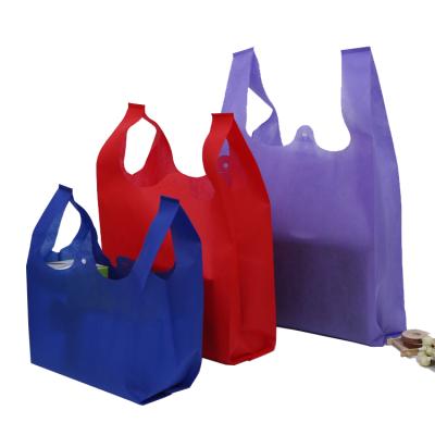 China Eco-friendly Cstom restaurant supermarket uses pp non woven tnt bags promotional t-shirt shopping bags for sale