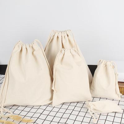 China Promotionai Reusable Organic Organic Cotton Drawstring Bag Logo Design Dust Bag Small Pouch Calico Canvas Cosmetics Bag for sale