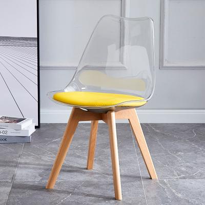 China Transparante plastic tulpen Eettafel stoelen PU kussen Beuken houten benen Te koop