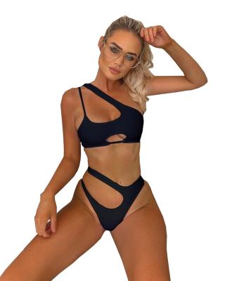 China 2pcs Outlet Breathable Sexy Hollow Out Bikini Set Women Matching One Shoulder Swimsuit for sale