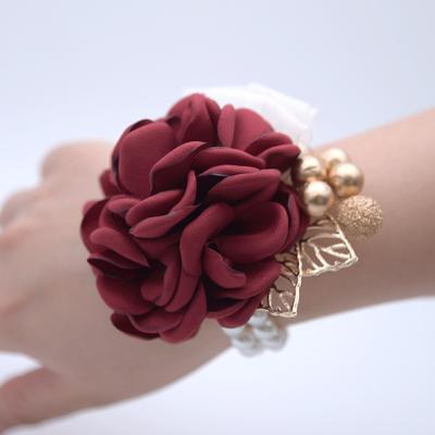 China New Design Eco-friendly Bridesmaid Bracelet Hand Wedding Wrist Corsage Artificial Floral Flower Wristband for sale