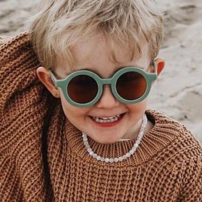 China Fashion sunglasses wholesale designer cute child around outdoor sports shades retro 2022 summer kids sunglasses UV400 gifts for sale