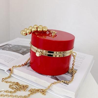 China Motion Sensing Summer Candy Color Jelly PVC Bags Seller Top Pearl Handle Round Bag Cross Chain Shoulder Fashion Women Grab Handbag 2021 Pure for sale