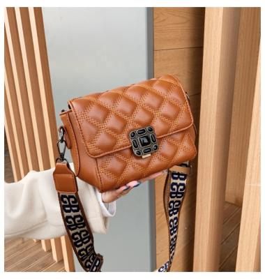 China Fashion embossing PU leather candy color cross chain shoulder ladies fashion bags and purses small handbag woman wholesale bag for sale