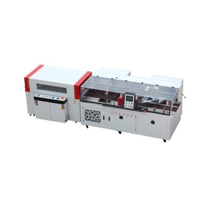 China GARMENT IPhone Boxes High Speed ​​Automatic Sealer And Shrink Wrap Machine for sale