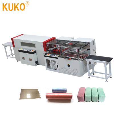 China Automatic GARMENT Shrink Wrapping Package Machine High Speed for sale