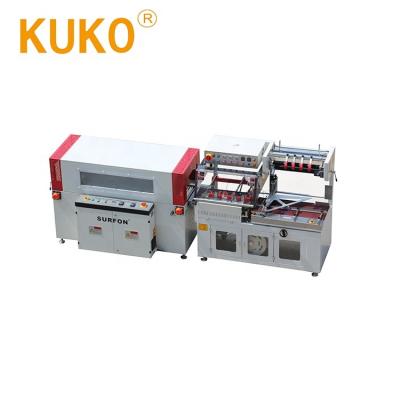 China CLOTHING L automatic gumdrop sealer and shrink wrap machine for lever arch folder for sale