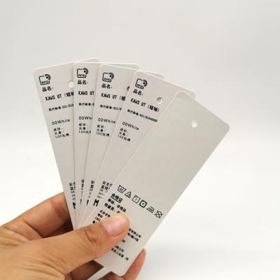 China Paper Coated CPE Programming ISO 18000-6C UHF RFID Clothing Tag With Custom Print And Data Coding for sale