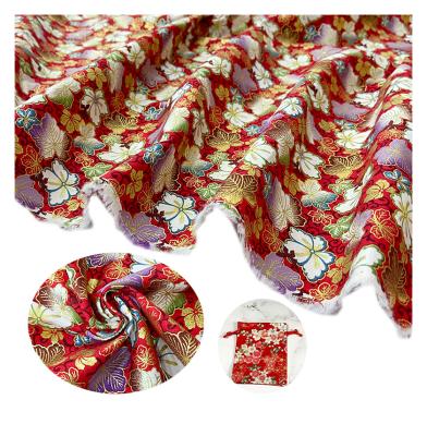 China Organic Factory Customized Japanese Style Bronzing Red Floral Handmade DIY Fabric for sale