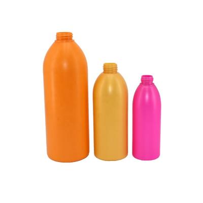 China High Quality Personal Care Boston Round 1000ml/32oz HDPE Squeeze Bottle Cylinder With 32/410 Lotion Pump Shampoo Bottle for sale