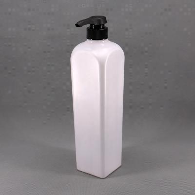 China Manufacturer 1000ml Cosmetic Round Empty China PET Plastic Baby Hand Wash Shampoo Lotion Bottle With Lotion Pump for sale