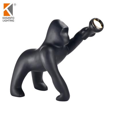 China Factory Wholesale Modern Animal Resin Black Gorilla Floor Stage Lamp For Hotel Store Living Room Office Decoration Arched Floor Lamp for sale