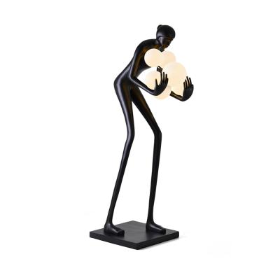 China Modern Large Person Modern Hotel Lobby Fiberglass Decoration Black Floor Lamp For Led Reverberation Room Hotel Lobby for sale