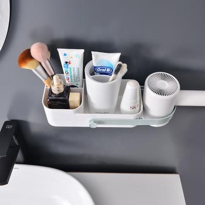 China Plastic Daily Arrangement Shelf Bathroom Hairdryer Storage Rack Necessities Toothbrush Toothpaste Stocked Hanging Shelf for sale