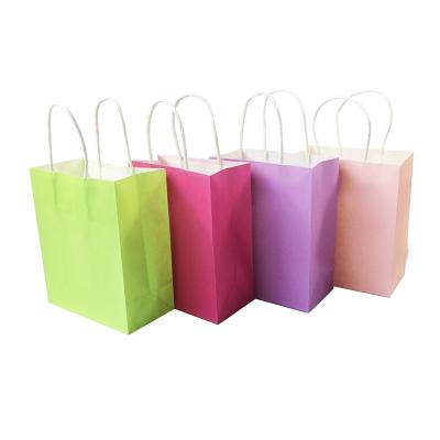 China Delicate Recycled Materials 18x15x8cm Lovely Small Kraft Gift Bag With Handle Children's Day Christmas Birthday Gift Bags Jewelry Bags for sale