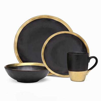 China Newest Stocked Porcelain Dinner Sets Serving Plate Salad Bowl Cup Black Ceramic Dinnerware Set With Gold Rim for sale