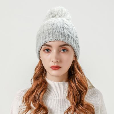 China COMMON Wholesale Custom Knitted Beanie Hat Gradient Gray Women's Winter Pom Knit Hats With Pom Pom for sale