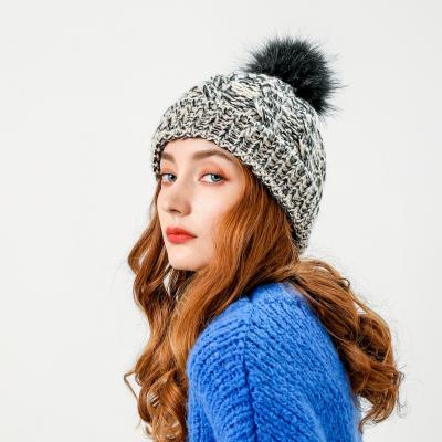 China COMMON custom winter hats women ribbed knit pom pom beanie hats for sale