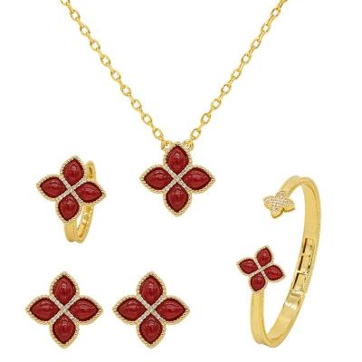 China New Environmental Friendly Four Leaf Clover Design Sense Necklace Ring Earrings Bracelet Lightweight Luxury Upper Set for sale