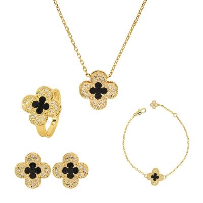 China Hot New Environmental Friendly Four Leaf Clover Design Sense Necklace Ring Earrings Bracelet Lightweight Luxury Top Set for sale