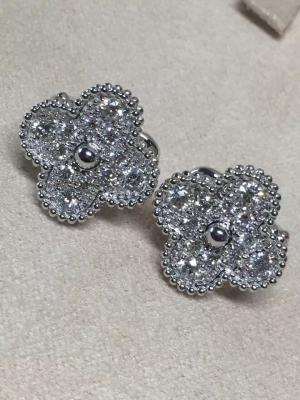 Chine Van Cleef et Arpels fait dans les earstuds doux d'Alhambra de porcelaine, 18K or, diamants, très avec du charme très brillant, bijoux de VCA à vendre