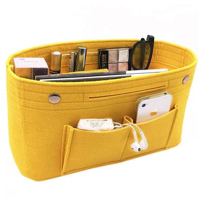 China Hot Sale Eco-friendly Felt Beauty Insert Bag Foldable Makeup Bag Felt Insert Cosmetic Bag For Ladies for sale