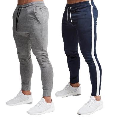 China Custom Logo Mens Outdoor Sport Elastic Casual Pants Fitness Casual Anti-Wrinkle Pantst With Pockets for sale